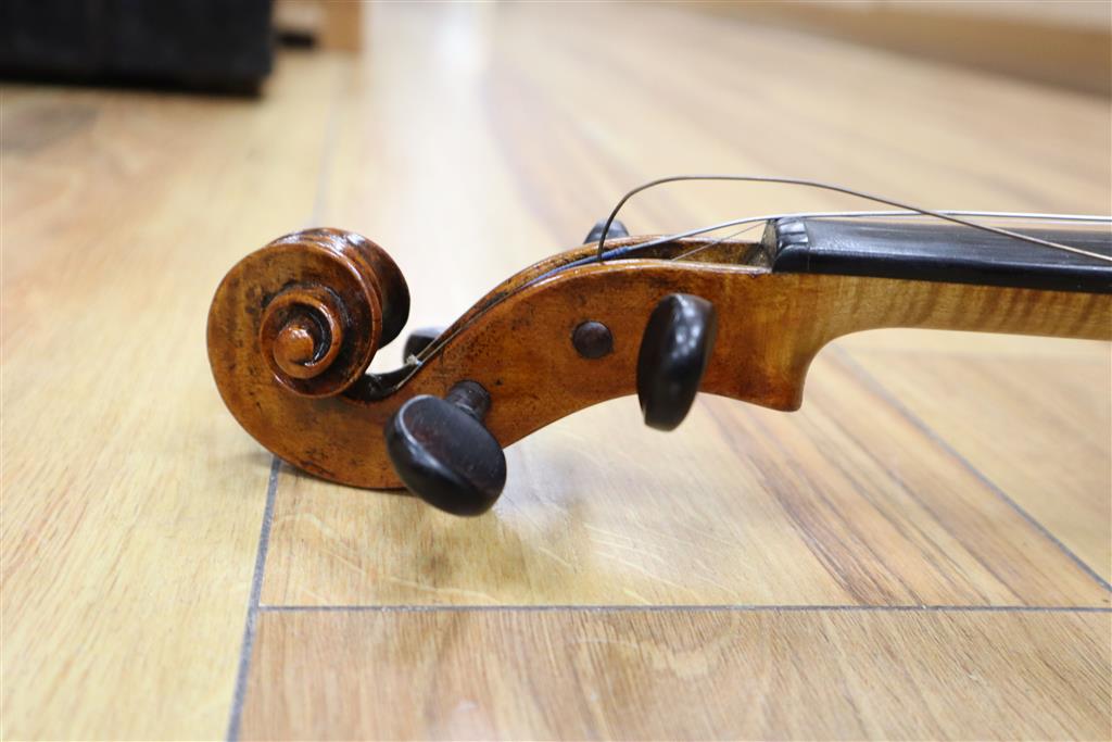 A 19th century Flemish? violin, length of back 35cm, cased with two bows